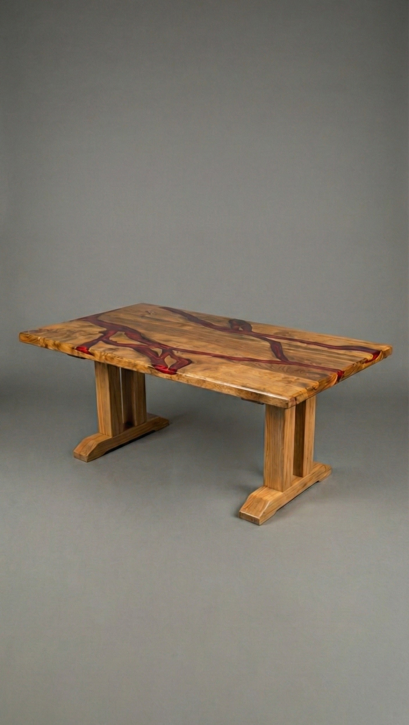 Geminis handcrafted table base installed on an epoxy lava river tabletop – Artisan & Sons